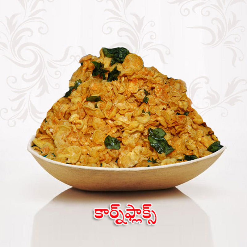 Crispy and spicy Cornflakes Mixture (Cornflakes Chavitu) with fried curry leaves, handcrafted by Athithi Gruha Foods.