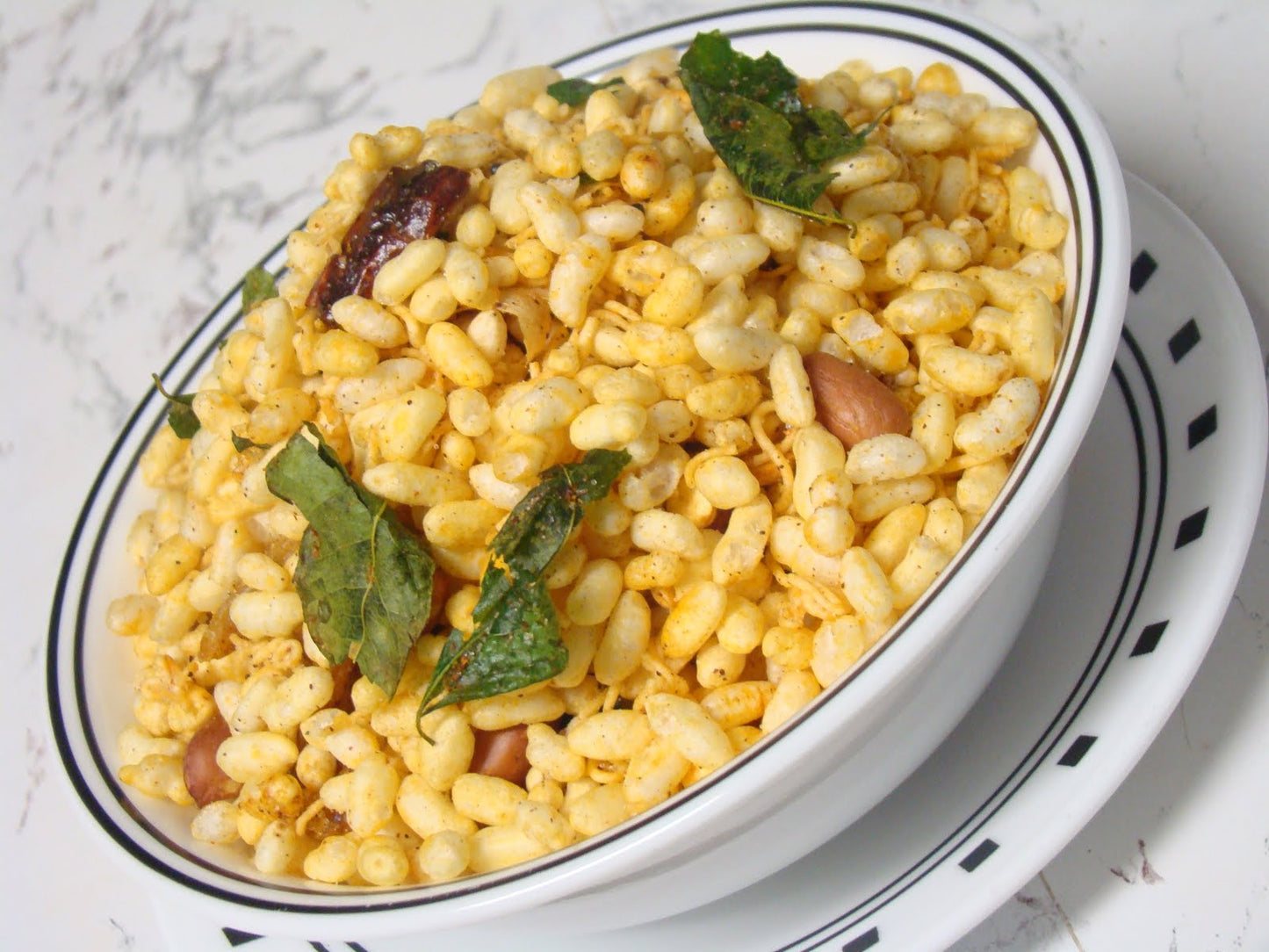 Crispy marmarala mixture made with puffed rice peanuts and spices Andhra snack