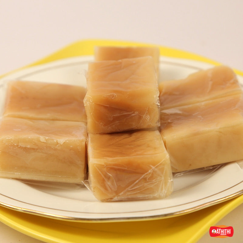 Soft milk mysore pak made with ghee and milk solids traditional Indian sweet
