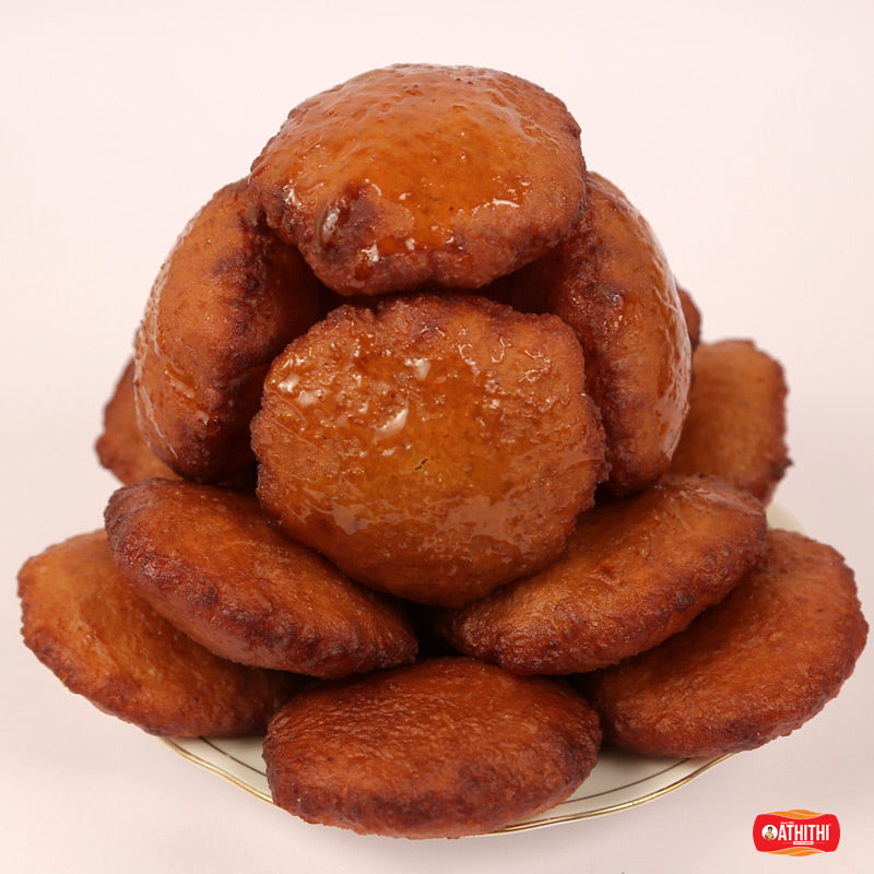 Traditional kobbari burelu sweet filled with coconut and jaggery stuffing.