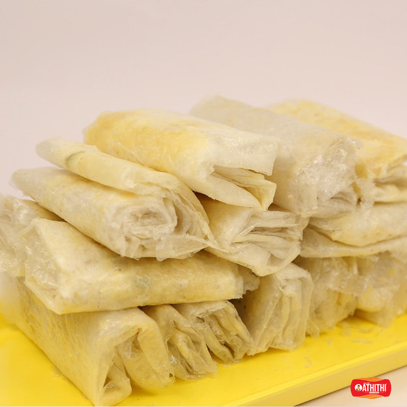 Pootharekulu sweet made with thin rice paper Andhra dessert