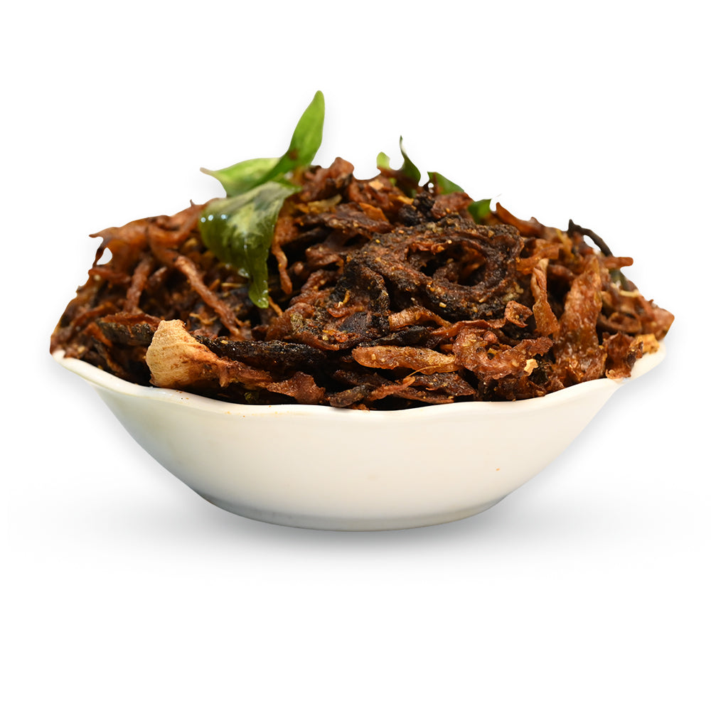 Authentic Andhra kakarakaya fry prepared with bitter gourd and traditional spices.