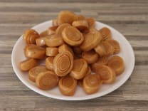 Healthy mini sugar-free Kaja pieces with a distinct spiral pattern, offering traditional Andhra taste from Athithi Gruha Foods.