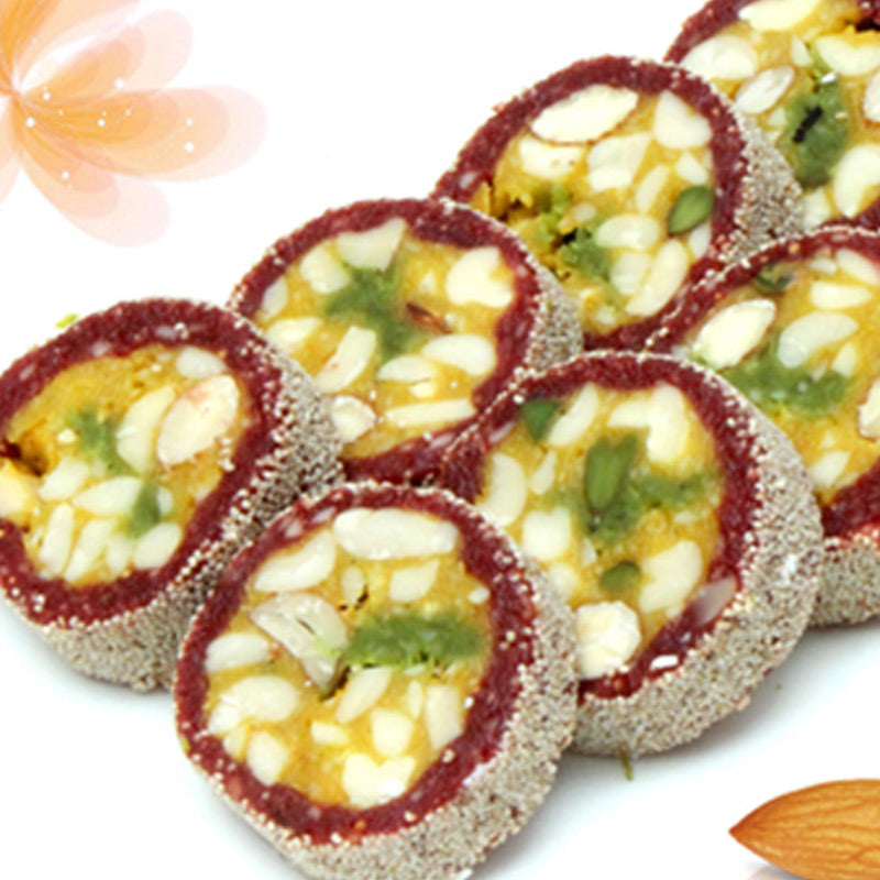 Cashew Thoph sweets shaped like traditional pots with colorful garnishes, by Athithi Gruha Foods.