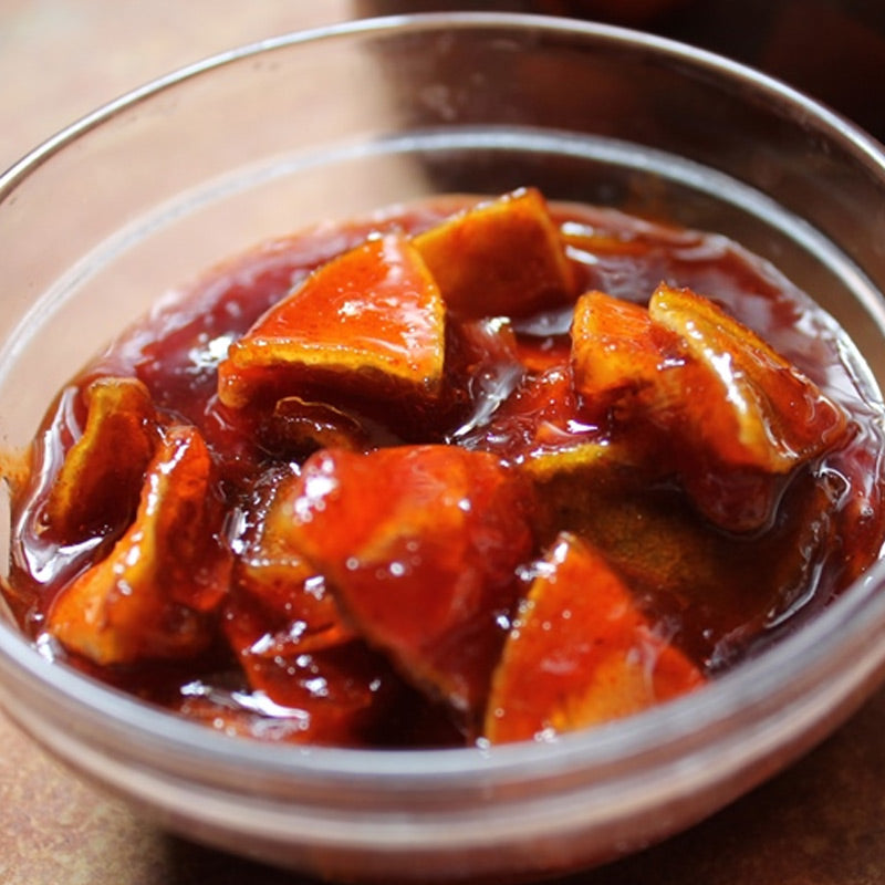 Authentic Andhra style Dabbakaya Pickle (Indian Citron Pickle) with thick, tangy pieces in a spicy red gravy, handcrafted by Athithi Gruha Foods.