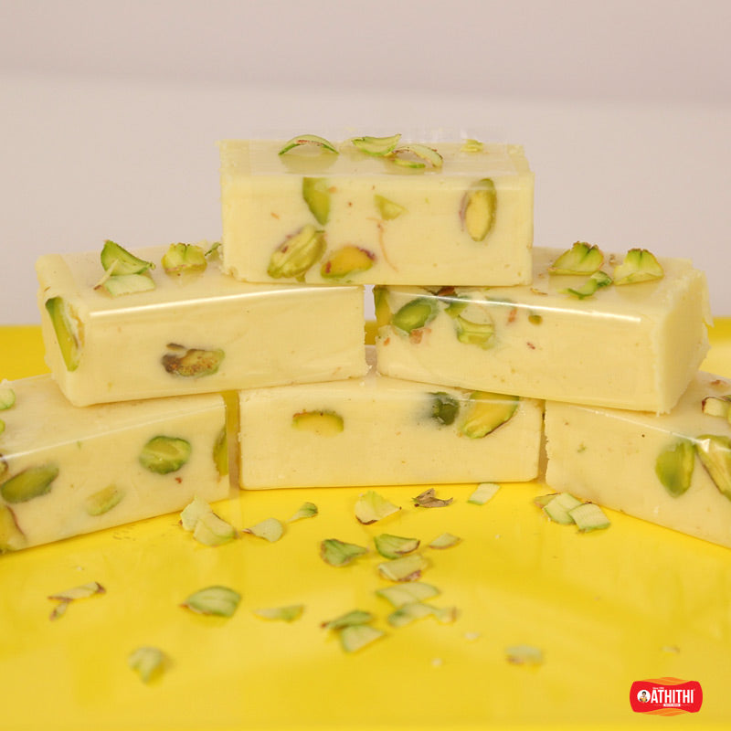 Soft and creamy ice cream burfi made from milk solids, a traditional Indian sweet with a smooth finish.