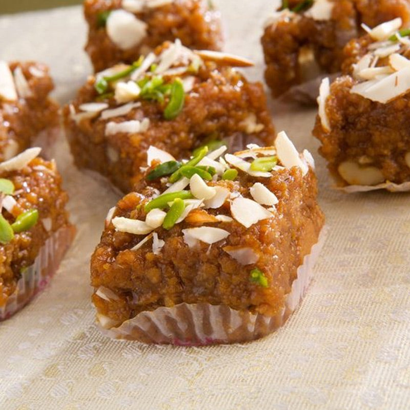 Rich kismis kalakand milk sweet infused with juicy raisins and creamy texture.