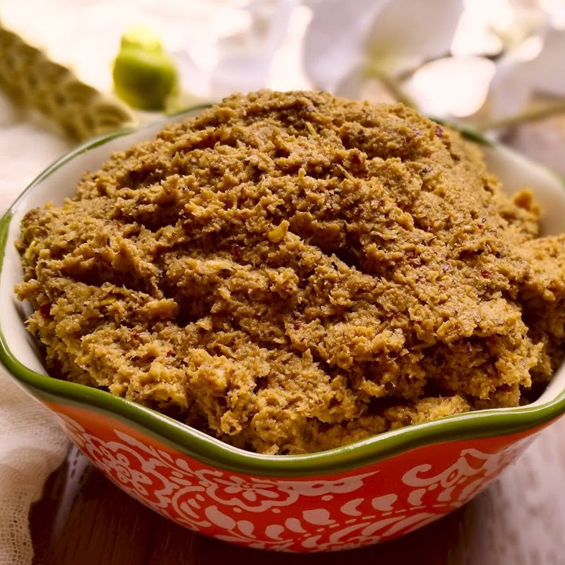 Spicy Kobbari (coconut) roti pickle prepared in traditional Andhra pachadi style.