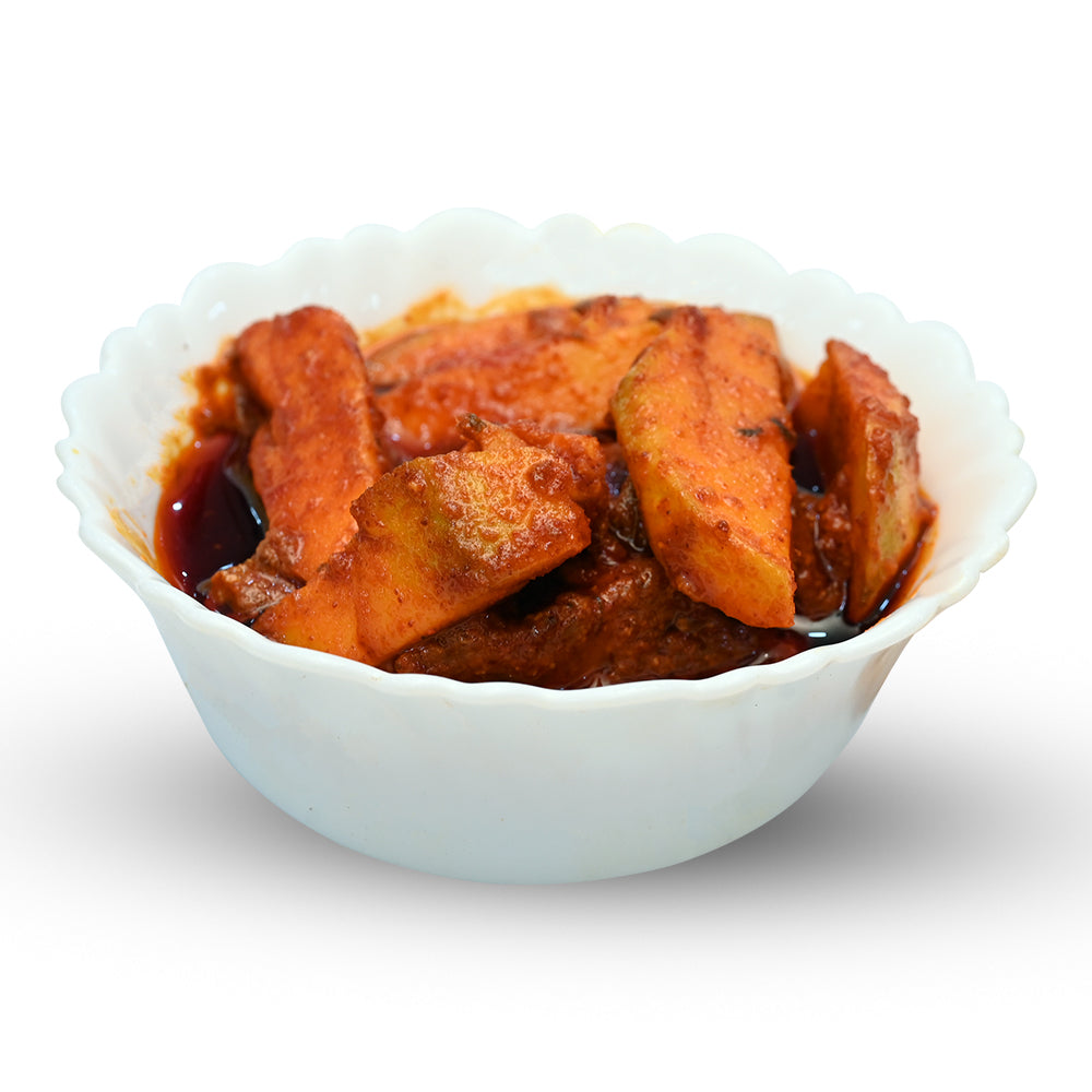Authentic magaya pickle made with sun dried mango pieces and traditional Andhra spices.
