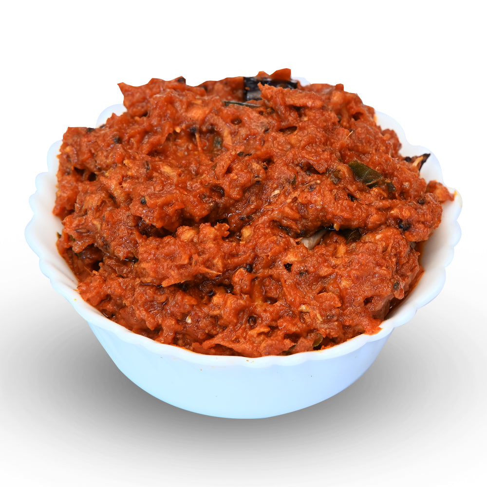 Spicy mamidi allam pickle made with raw mango and ginger in Andhra style.