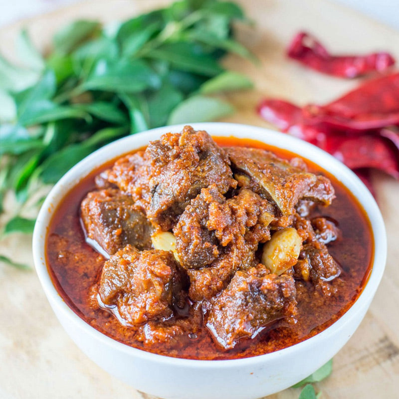 Spicy mutton pickle made with tender meat and Andhra spices

