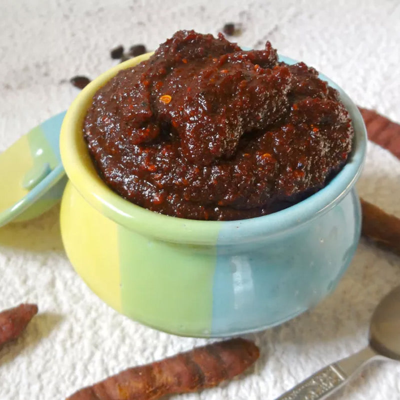 Tamarind pickle made with tangy imli pulp and traditional spices