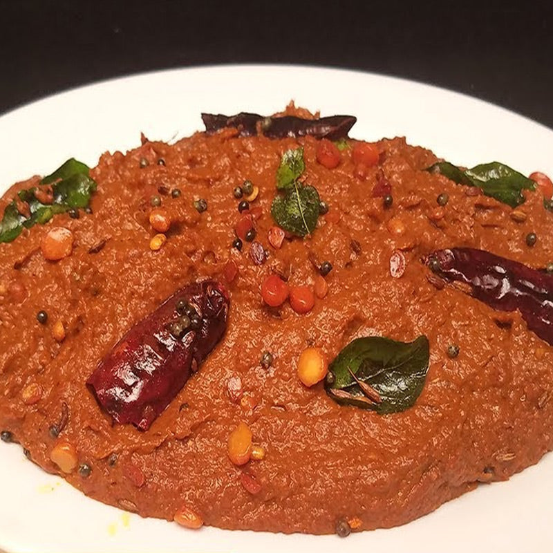 Spicy tamarind thokku pickle in thick paste form prepared in Andhra style for rice and dosa
