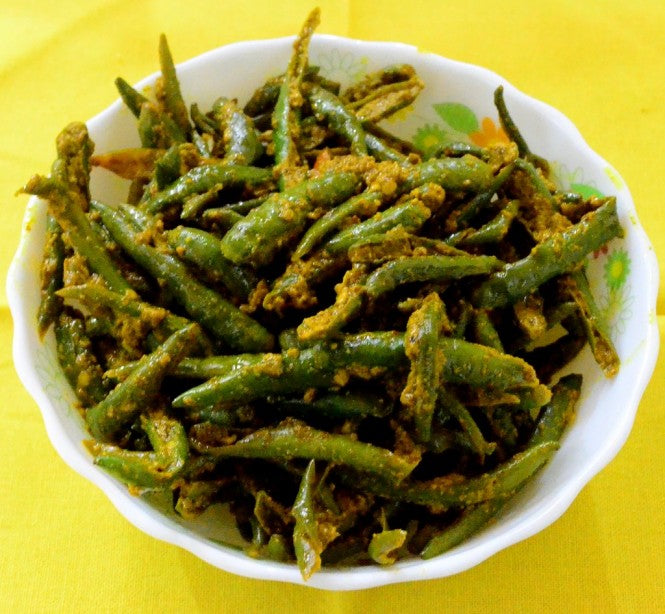 Fresh green chillies commonly used in Indian cooking to add natural heat and flavor to dishes.